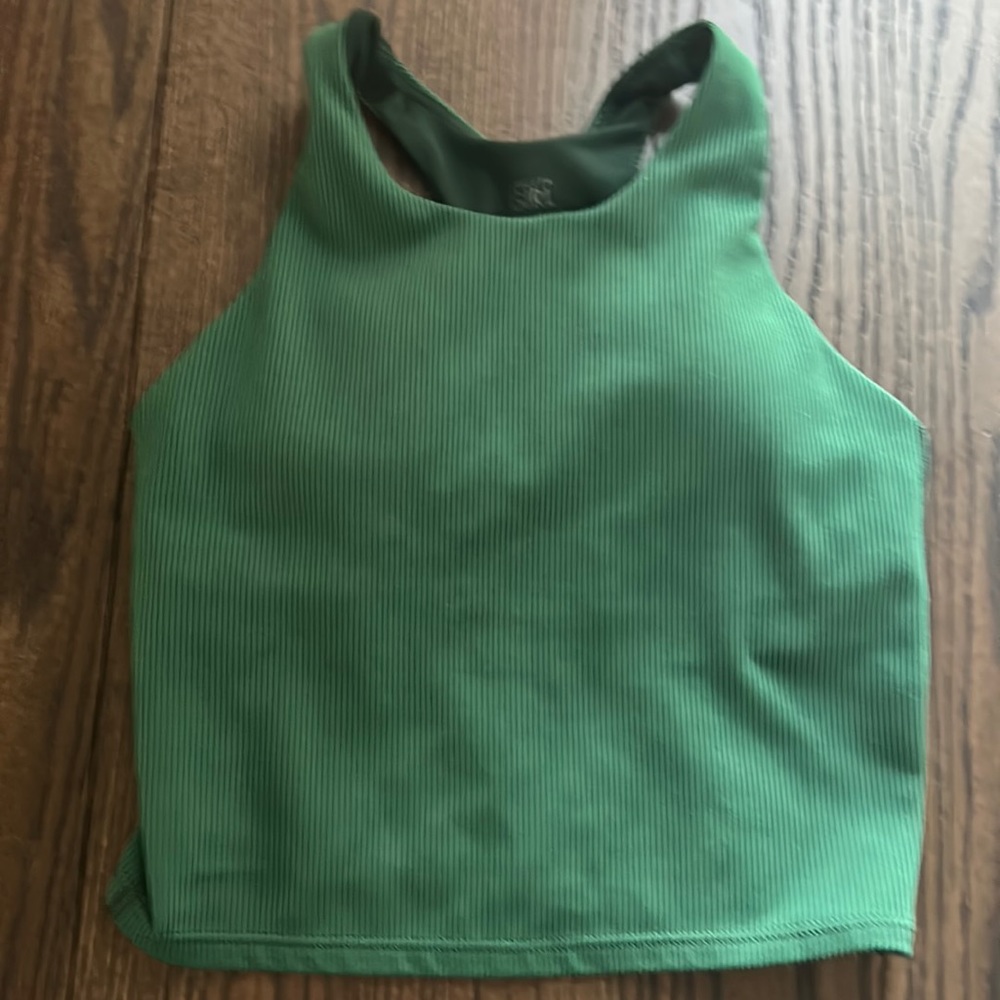 Green, crop tank top that is ribbed with a belt and bra from Athleta